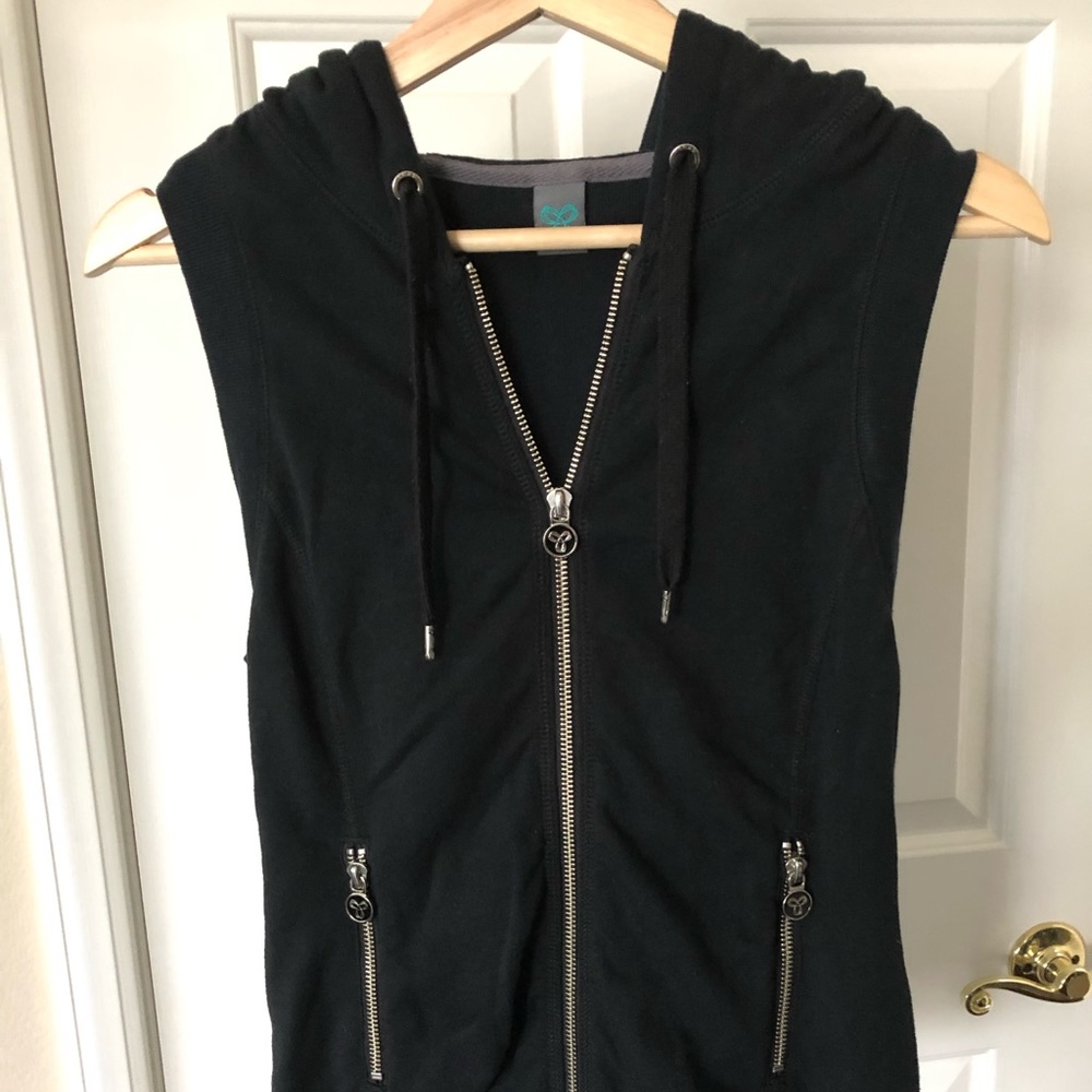 Black Aritzia vest with hood. Size XS.